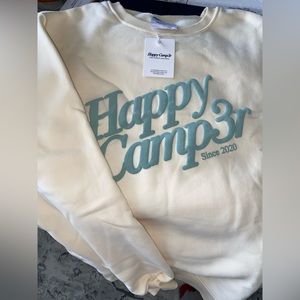 HAPPY CAMP3R CREWNECK. VANILLA WITH SAGE WRITING. NWT. SOLD OUT ONLINE.